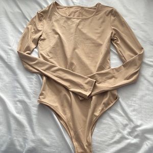 Light tan body suit size small